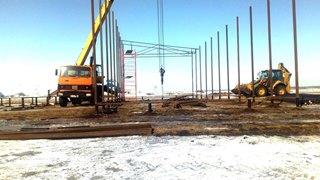 Аренда экскаватора погрузчика с ямобуром в Камень-на-Оби цена от 1576 руб